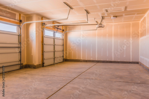 Interior of a garage under construction with unfinished walls