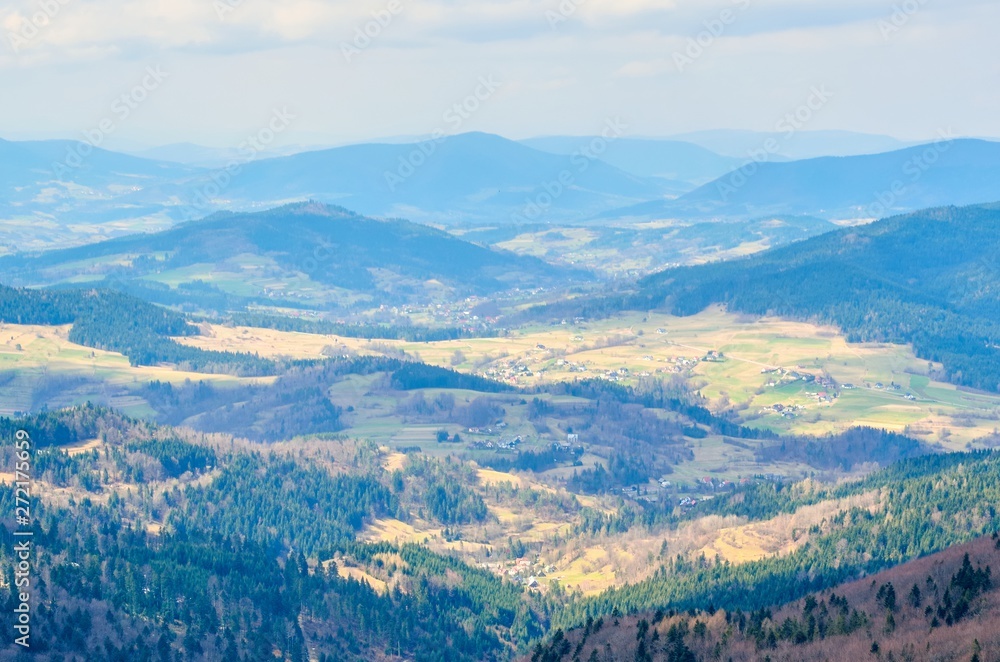 Beautiful spring mountain landscape. Fabulous view of the hills and valleys in Poland.