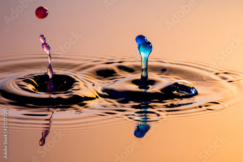 Two collision effect of two falling water drops - Drop Sculpture. photo