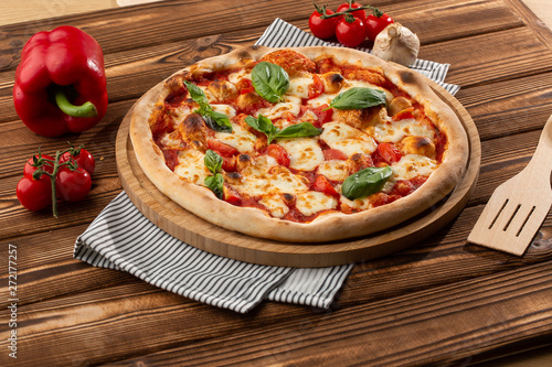 Flyer and poster for Restaurants or pizzerias, template with delicious taste margarita pizza, mozzarella cheese, cherry tomatoes.