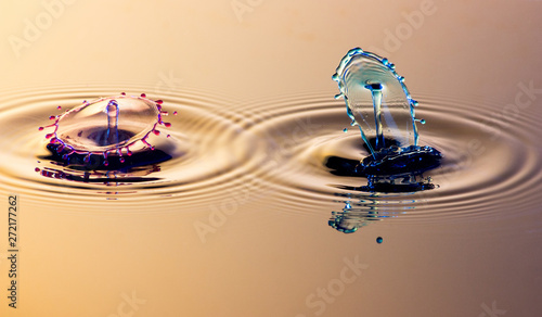 Two collision effect of two falling water drops - Drop Sculpture. photo