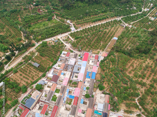 Aerial view  top view of small village with little courtyard and farm style house in the country side area of Huaibei next the mountain, China photo