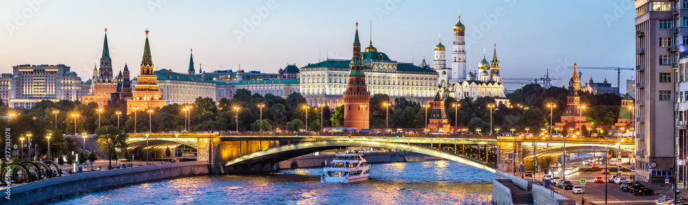Moscow Kremlin at night, Russia. Panoramic view of city. Cityscape with Moskva River in evening. - obrazy, fototapety, plakaty 