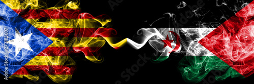 Catalonia vs Sahrawi smoke flags placed side by side. Thick colored silky smoke flags of Catalonia and Sahrawi