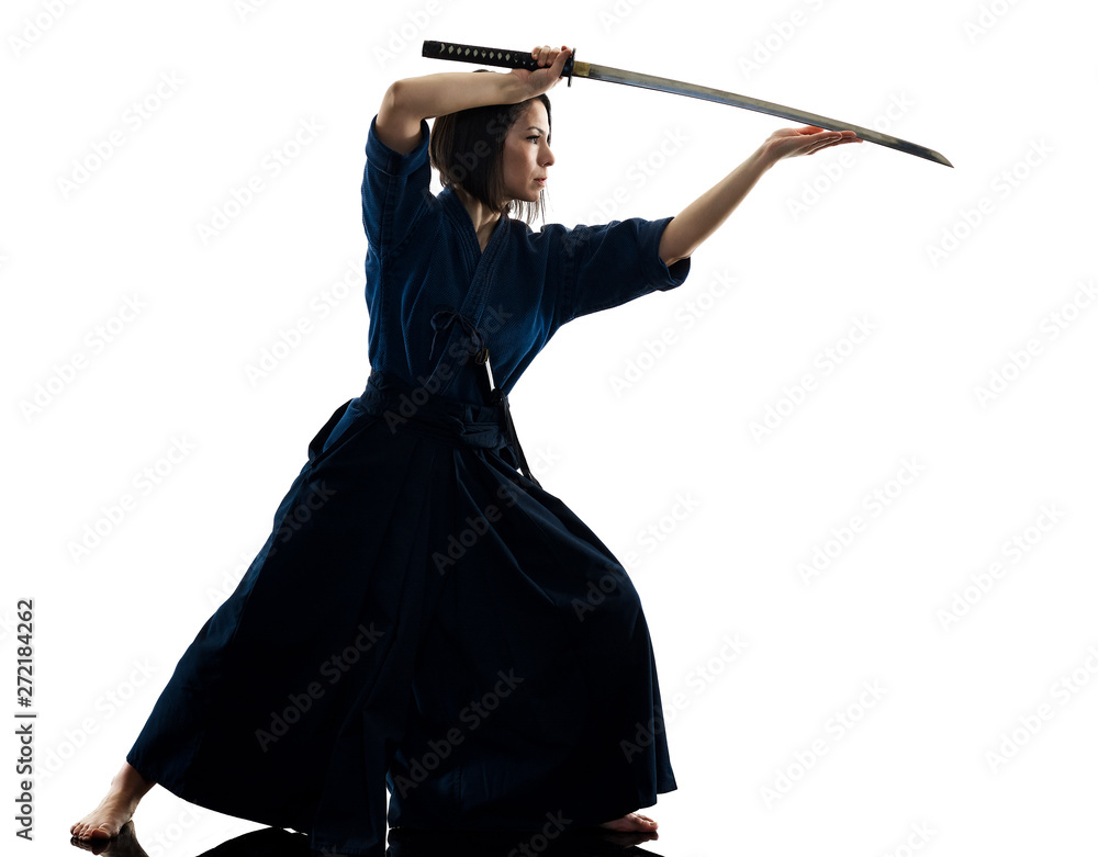 one caucasian woman practicing laido Katori Shinto ryu shadow silhouette isolated on white background one caucasian woman practicing laido Katori Shinto ryu shadow silhouette isolated on white background