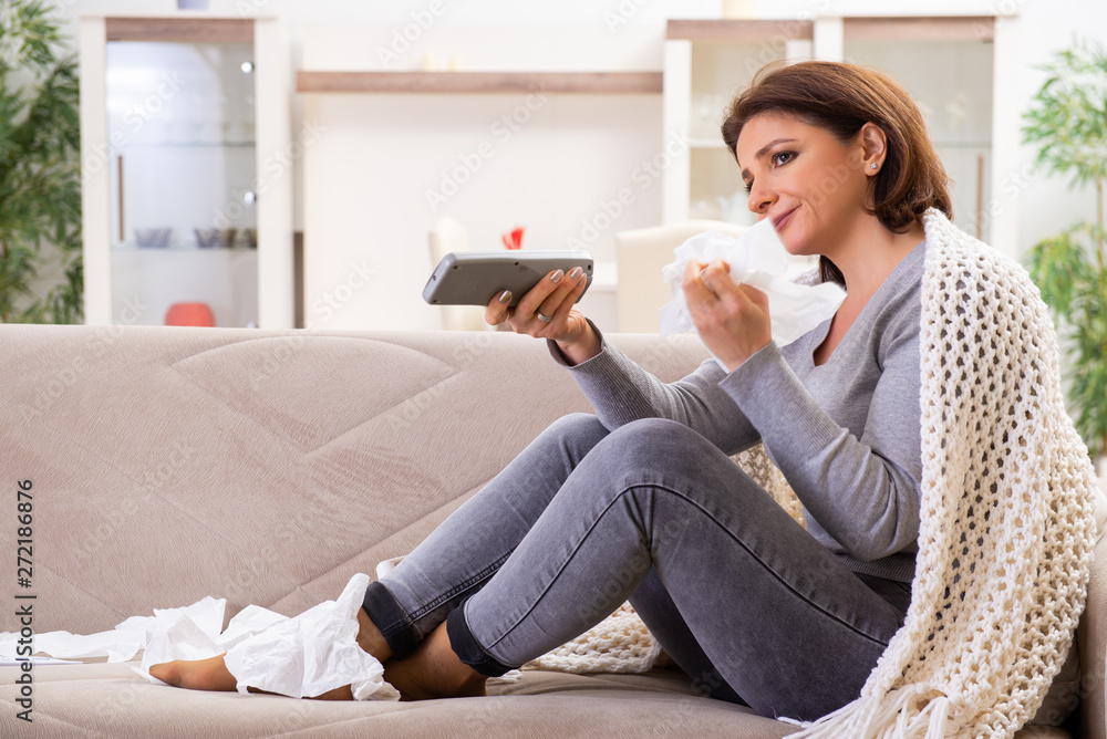Sick middle-aged woman suffering at home 