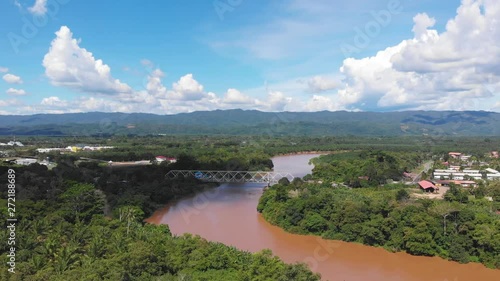 Footage of Beautiful Rural landscape scene with clear blue sky at small town TENOM, SABAH, MALAYSIA photo