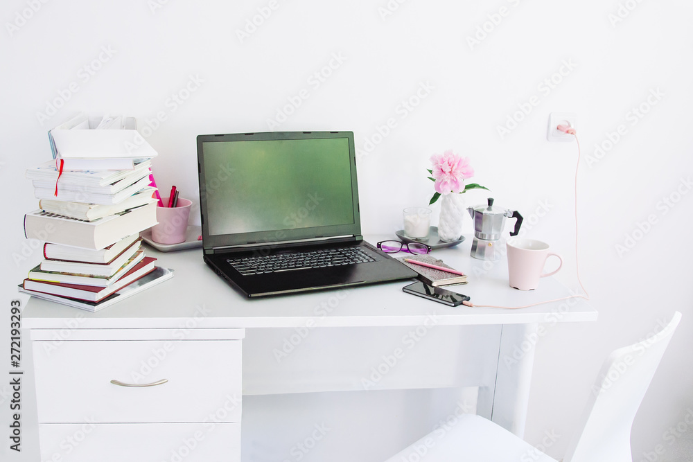 Obraz premium Dorm room, table with stationery and laptop. back to school, ready for studying.