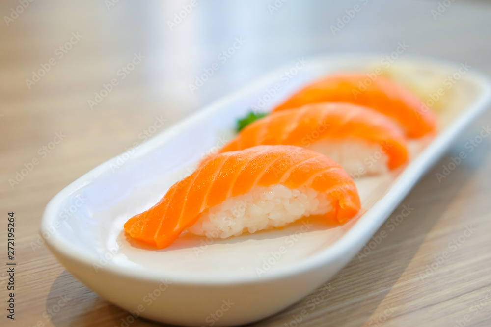 Salmon sushi japanese food. Raw Salmon fish on rice Salmon sushi japanese food. Raw Salmon fish on rice