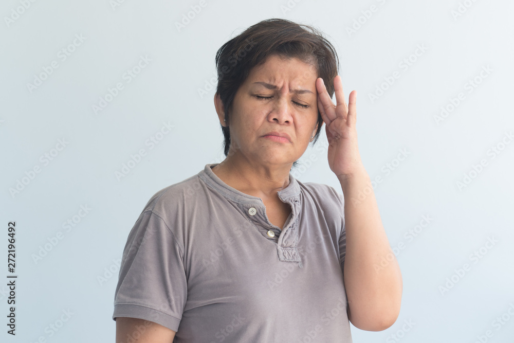 sick asian senior woman suffering from headache sick asian senior woman suffering from headache