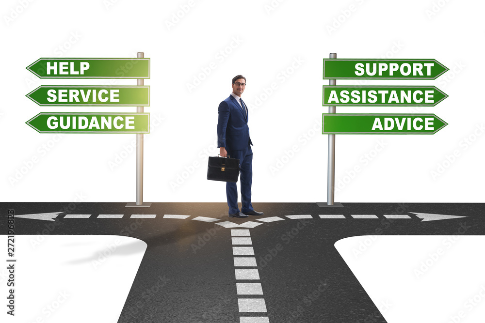 Businessman having hard choice standing at crossroads Businessman having hard choice standing at crossroads