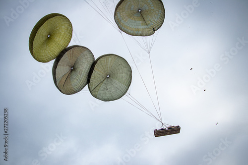 vehicle parachuting down