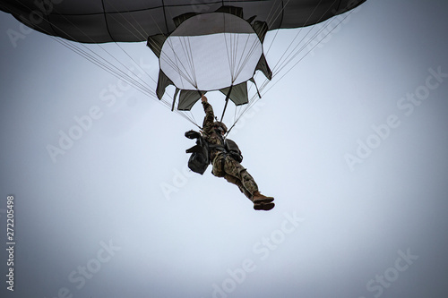 parachutist helicopter airborne operations airplane explosions missiles