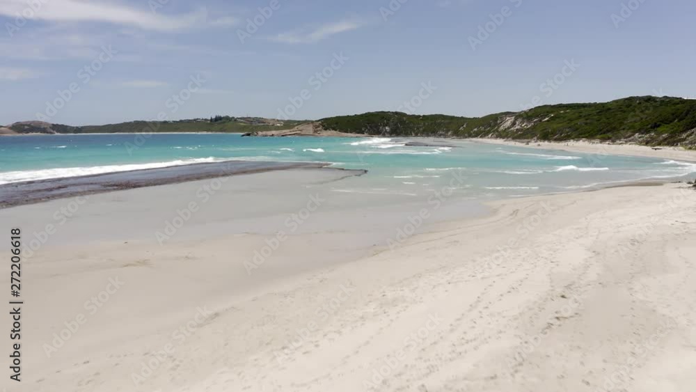 Aerial Forward: Vibrant Blue Ocean Waves On Shore Surrounded Grassy Hills - Esperance, Australia Aerial Forward: Vibrant Blue Ocean Waves On Shore Surrounded Grassy Hills - Esperance, Australia