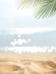 Sand with blurred Palm and tropical beach bokeh background, Summer vacation and travel concept. Copy space