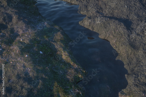The river between the mountains in a sunny day, 3d rendering