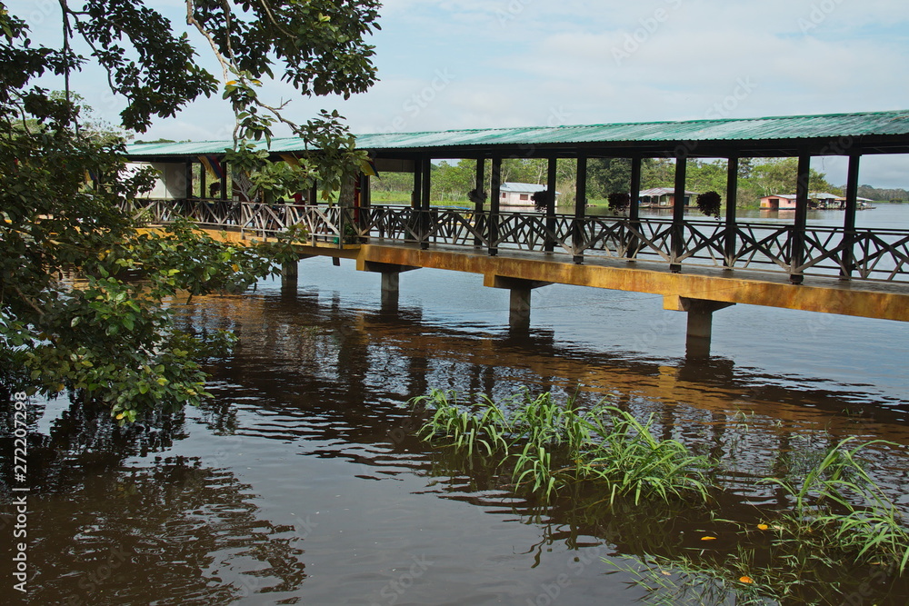Bridge at Amazonas river in Puerto Narino in Colombia