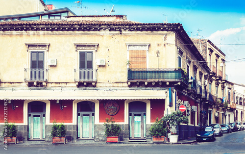 Italy, beautiful cityscape of Sicily, historical street of Catania, facade of old buildings .