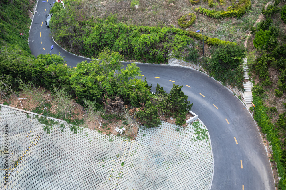 Shooting s curved road from the top