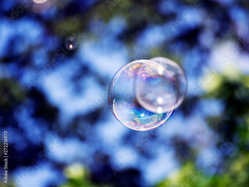 Abstract background with soap bubbles, close up, with reflection