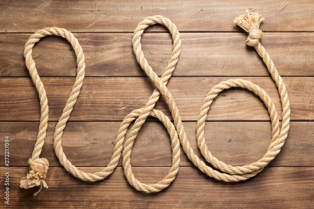 ship rope at wooden background texture ship rope at wooden background texture