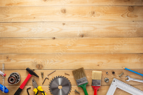 set of tools and instruments at wooden background