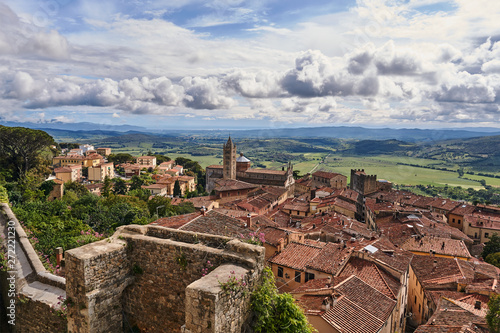 View of the houses and the church from the castle tower of the city of Massa_Maritima in Tuscany.