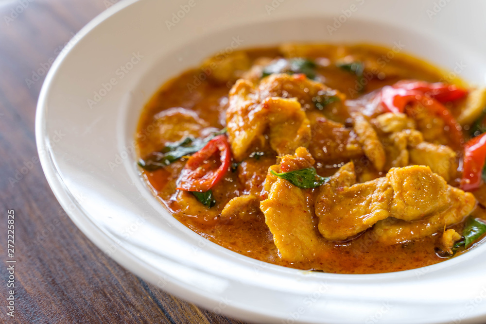 Thai Red Curry with Pork on wooden table Thai Red Curry with Pork on wooden table