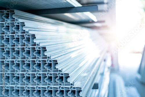 Photos Stack of PVC plastic elements in workshop for door and window profile production line