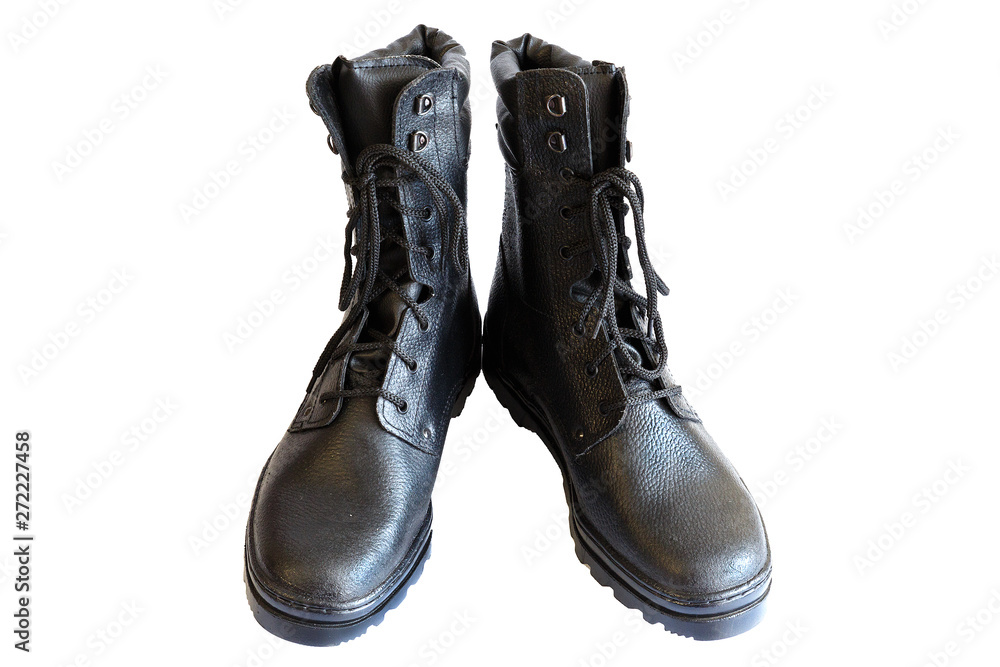 Black army boots on white background. Special footwear. Isolated. A pair of military boots. No people.