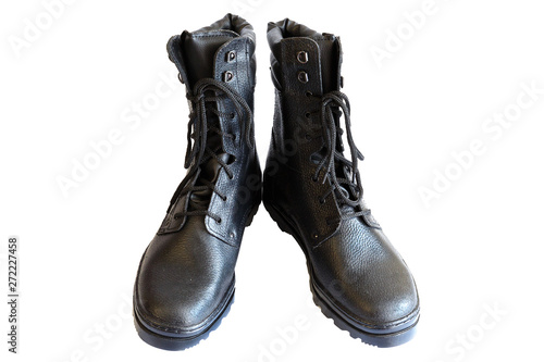 Black army boots on white background. Special footwear. Isolated. A pair of military boots. No people.