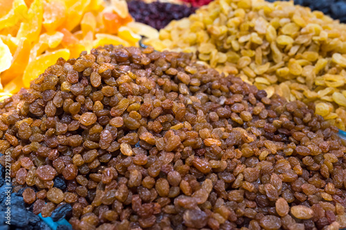 Natural background made from different kinds of raisins.