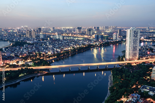 Aerial skyline view of Hanoi cityscape at twilight. Linh Dam peninsula  Hoang Mai district  Hanoi  Vietnam
