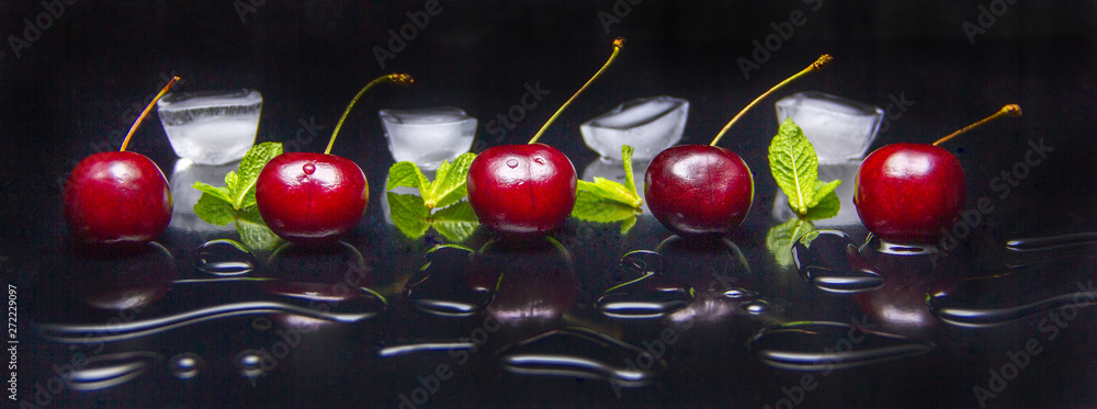 fresh cherries with mint leaves and pieces of ice - obrazy, fototapety, plakaty 