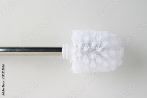 toilet brush in white and silver