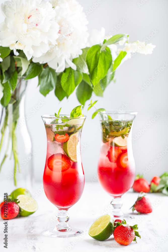 Pink lemonade with strawberries, lime, basil and mint Pink lemonade with strawberries, lime, basil and mint