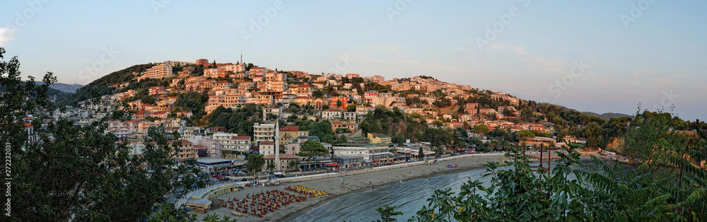 Panoramic view on Ulcinj old town fortress with purple after sunset light. Adriatic sea at sunset in Montenegro.