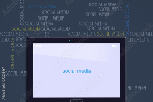 Social media concept. Tablet on the background of various inscriptions of social media on a dark background. Social media background. Connection