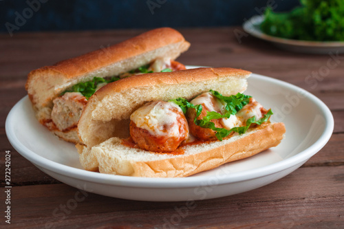 meatball sandwiches on white plate close up