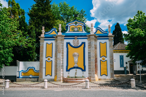Vintage and colorful stone fountain in Azeitao village, Setubal, Portugal photo