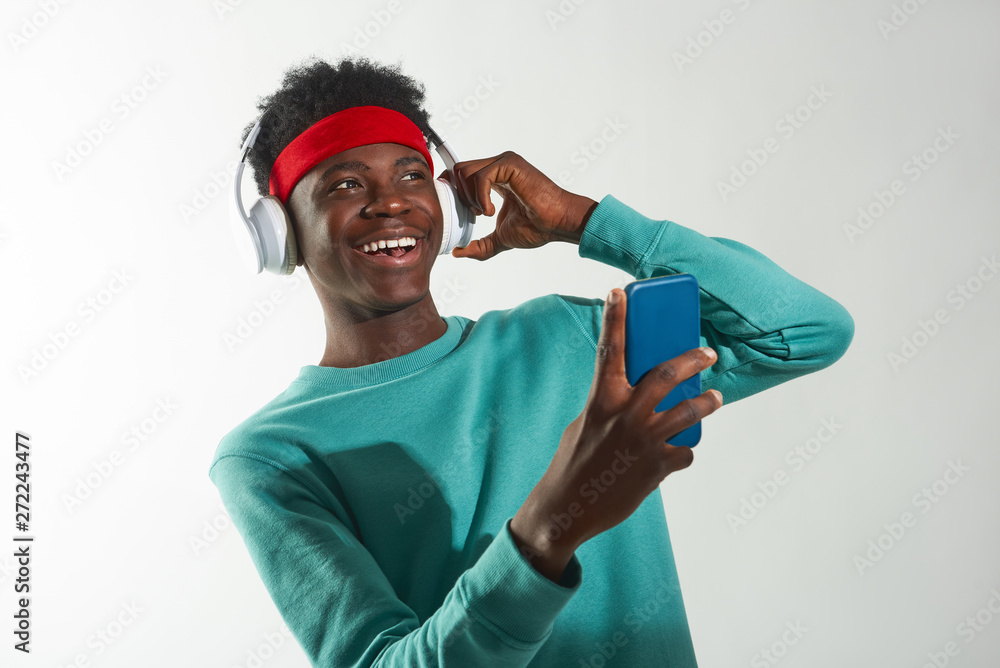 Happy young man looking away with slight smile Happy young man looking away with slight smile