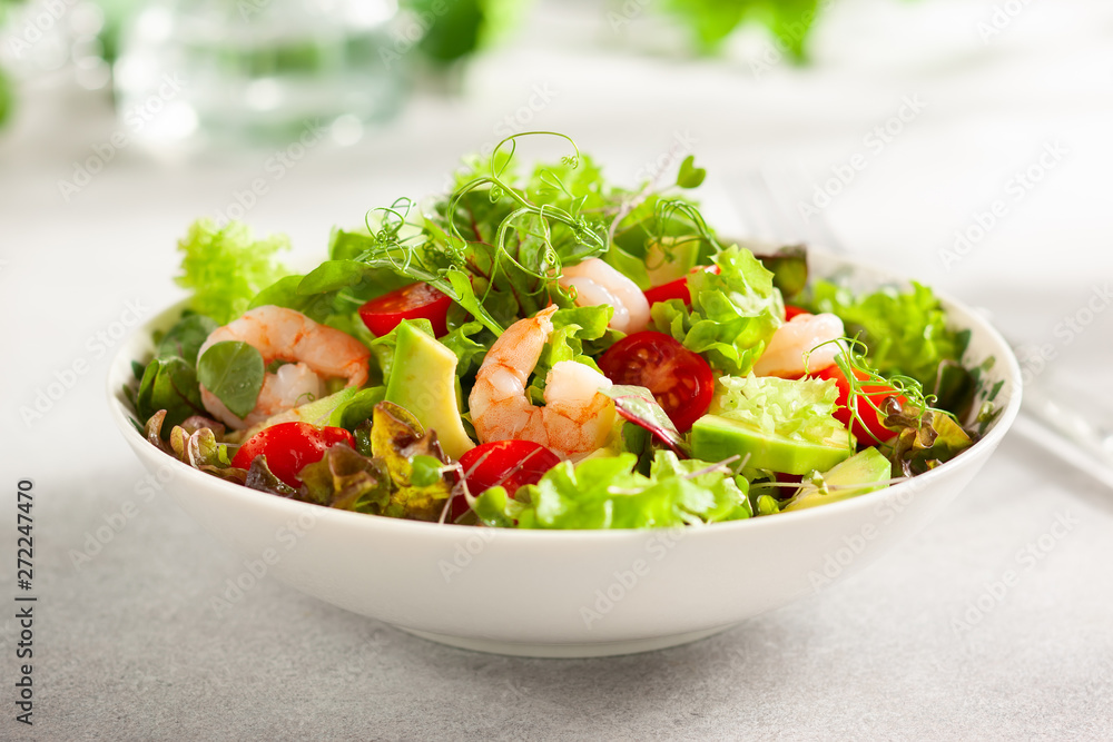 Fresh summer salad with shrimp, avocado and tomato Fresh summer salad with shrimp, avocado and tomato