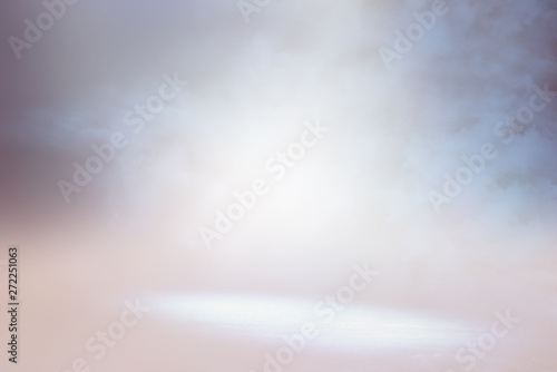 abstract bright concentrate floor scene with mist or fog, spotlight for display
