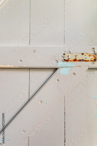 Old door with cracked paint background element