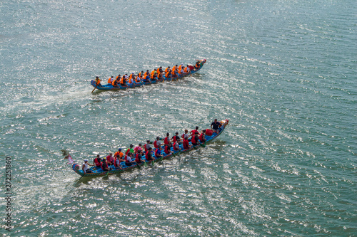 Photography a dragon boat on the river and racing