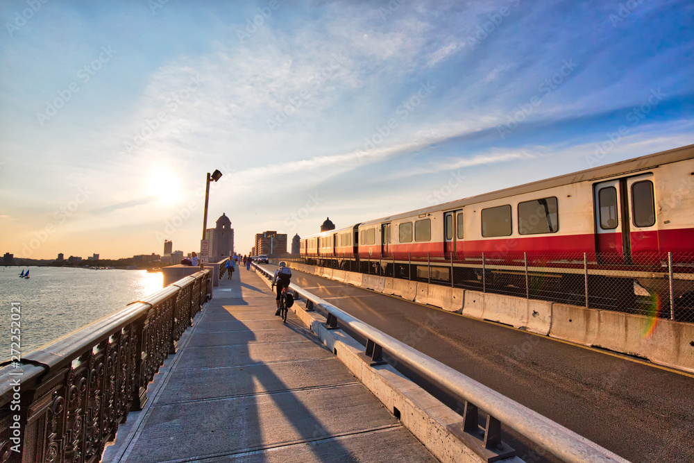 Boston, MA, USA-20 October, 2018: Boston MBTA subway lines, train crossing Longfellow bridge over scenic Charles river