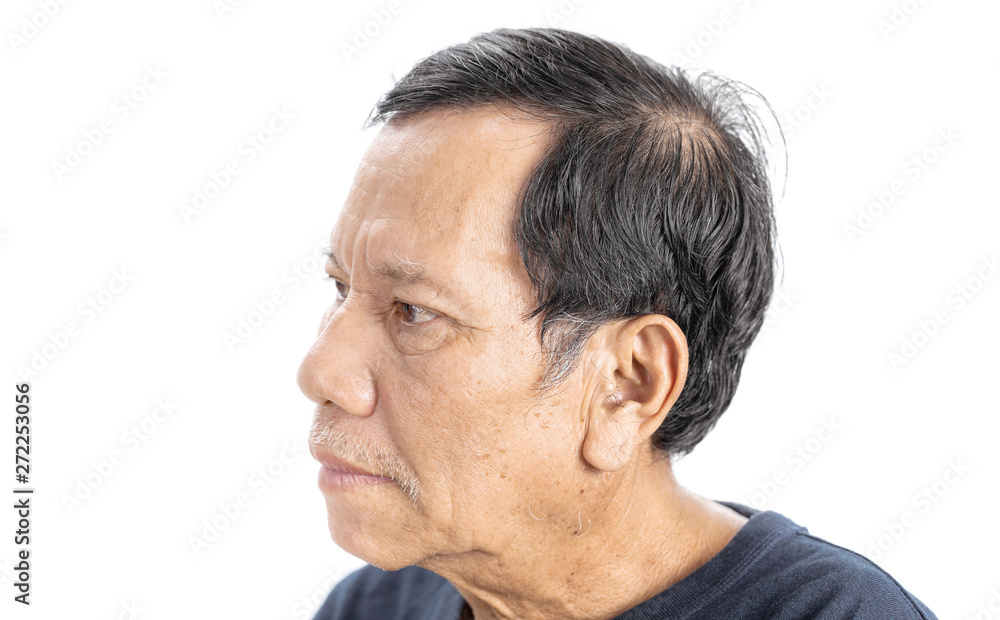 Obraz premium old wrinkled asian man portrait isolated on white background