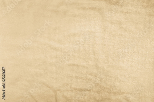 Cream abstract cotton towel mock up template fabric on background.