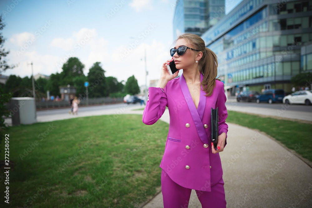 Young beautiful business woman talking on the phone. Business concept Young beautiful business woman talking on the phone. Business concept