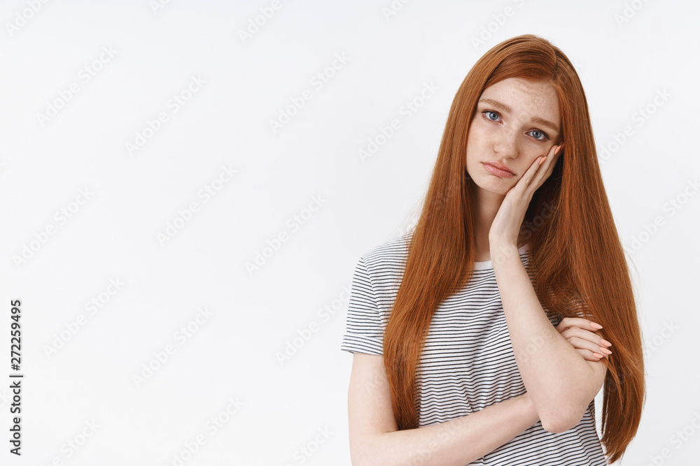 Unhappy moody sad redhead girlfriend blue eyes lean palm tilting head upset grieving, standing frustrated hear bad news unpleasant day, feel uneasy disappointing day, white background Unhappy moody sad redhead girlfriend blue eyes lean palm tilting head upset grieving, standing frustrated hear bad news unpleasant day, feel uneasy disappointing day, white background